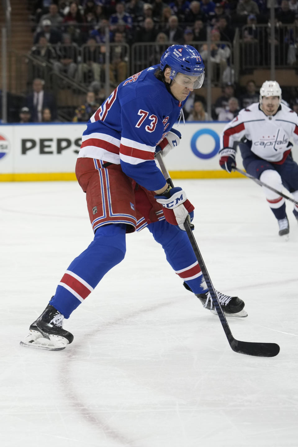 New York Rangers' Matt Rempe takes a shot during the third period in Game 1 of an NHL hockey Stanley Cup first-round playoff series against the Washington Capitals, Sunday, April 21, 2024, in New York. (AP Photo/Seth Wenig)