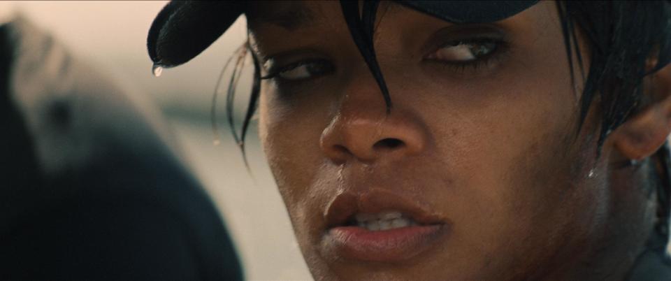 In this film publicity image released by Universal Pictures, Rihanna is shown in a scene from "Battleship." “Battleship,” a Universal Pictures movie based on the Hasbro Inc. board game, has survived an armada of tomato-throwing critics and chugged to $170 million in ticket sales overseas. The haul goes part way to justifying the reported $209-million price tag, but after subtracting splits with theater owners, it is estimated to need about half a billion at box offices to turn a profit. With a fleet of other hotly expected blockbusters surrounding its U.S. release on May 18, the tides need to be solidly in its favor to stay above water. (AP Photo/Universal Pictures)