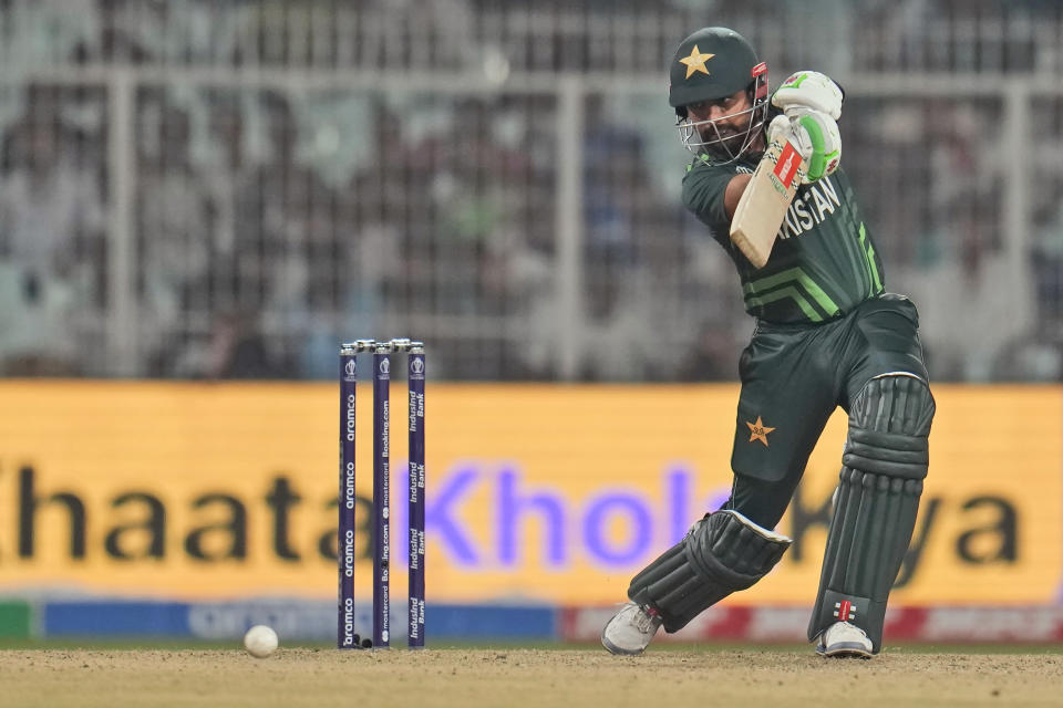 Pakistan's captain Babar Azam plays a shot during the ICC Men's Cricket World Cup match between Bangladesh and Pakistan in Kolkata, India, Tuesday, Oct. 31, 2023. (AP Photo/Aijaz Rahi)