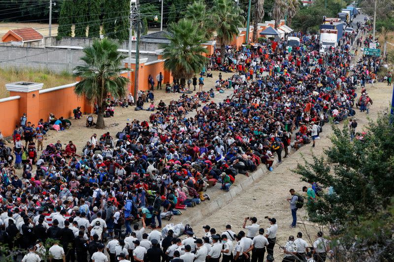 Hondurans take part in a new caravan of migrants, set to head to the United States, in Vado Hondo