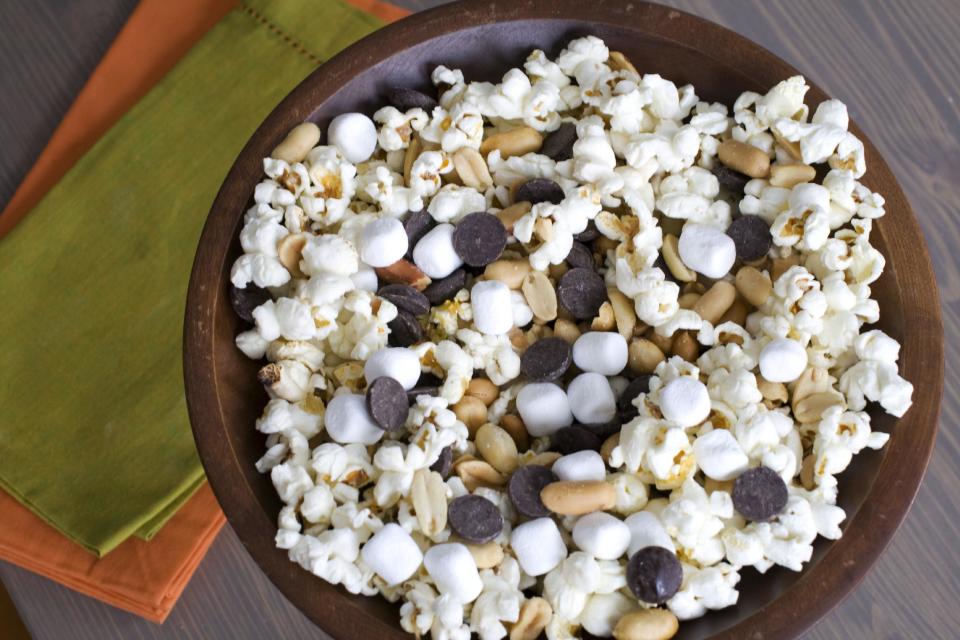 In this image taken on Jan. 28, 2013, the recipe for Stovetop Popcorn Many Ways with mini marshmallows, chocolate chips and salted peanuts is shown in Concord, N.H. (AP Photo/Matthew Mead)