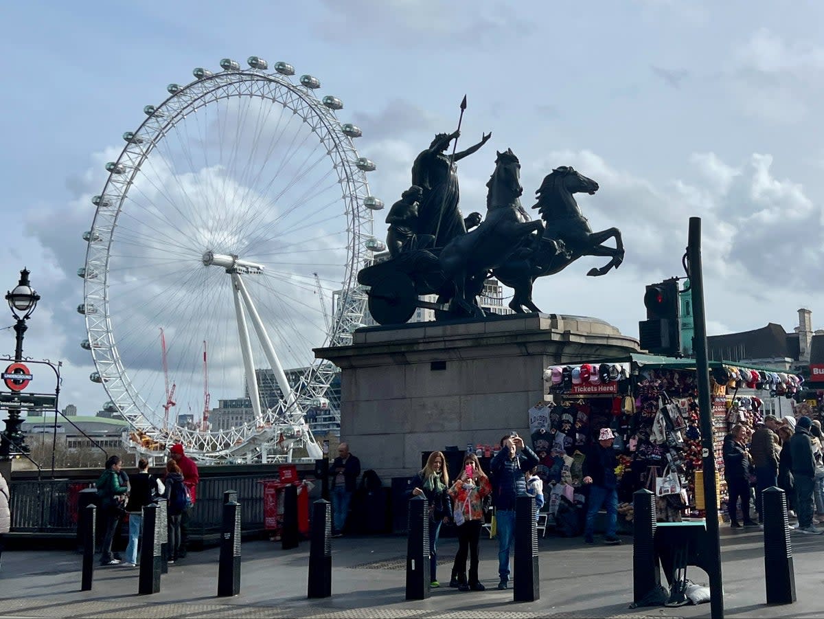 View from a bridge: Tourists, Boudicca and the London Eye as seen from Westminster, in the crime capital  (Simon Calder)