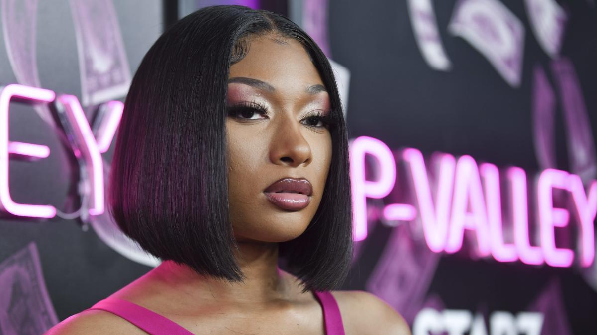 Megan Thee Stallion & Carl Crawford Throw Shots At Each Other