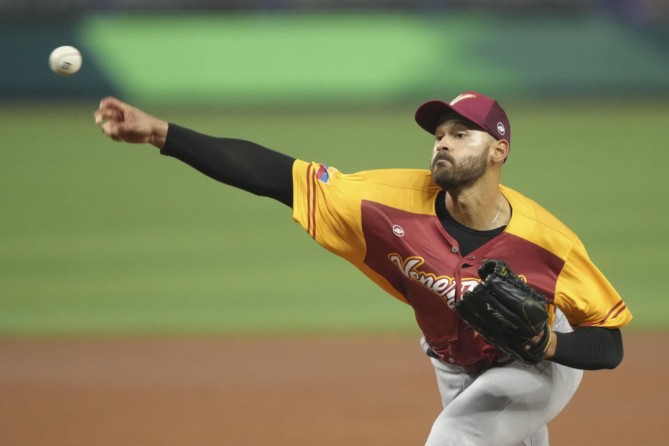 MIAMI, FLORIDA - MARCH 12: Pablo Lopez #49 of Venezuela throws a pitch during the first inning against Puerto Rico at loanDepot park on March 12, 2023 in Miami, Florida. (Photo by Eric Espada/Getty Images)