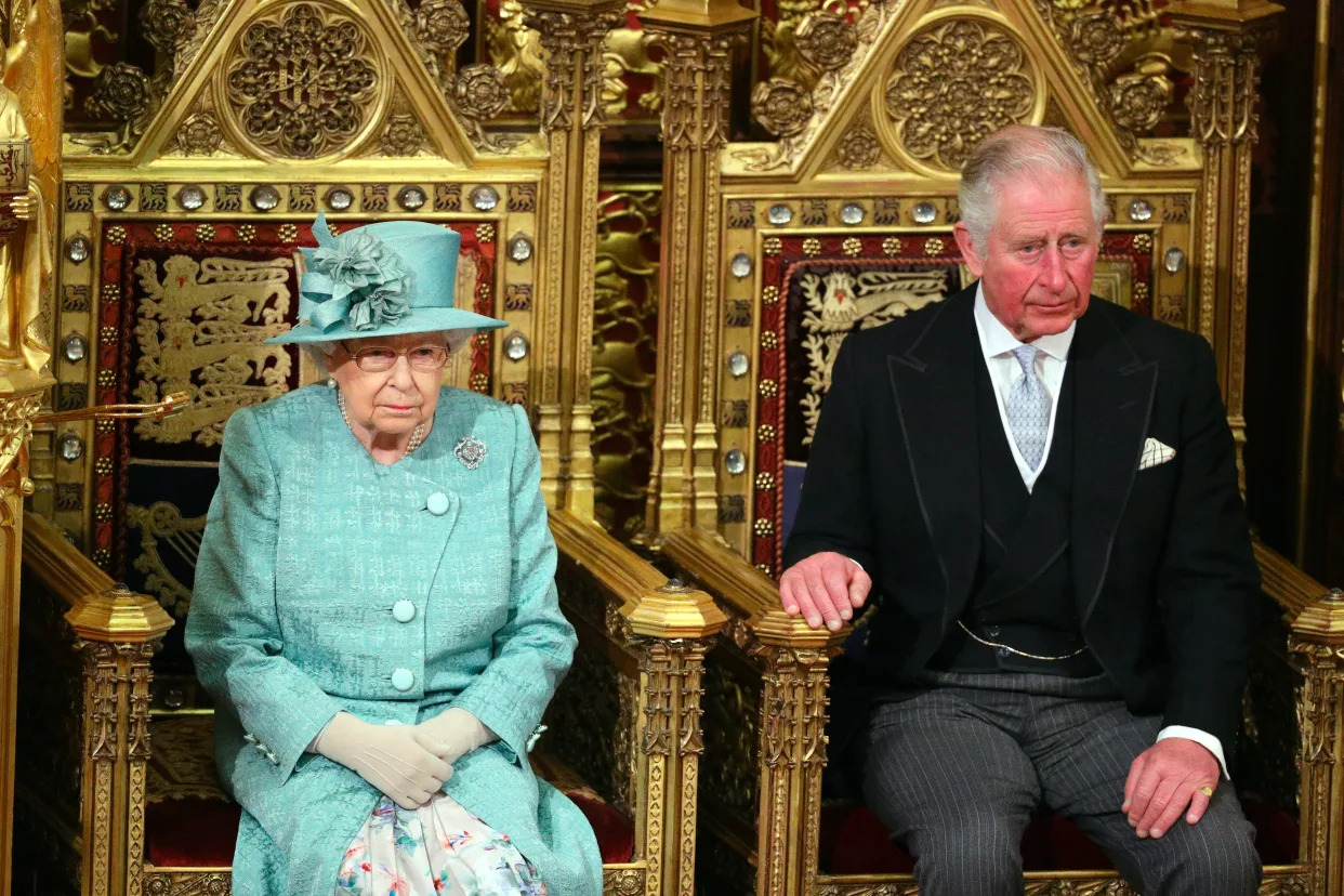 Queen Elizabeth II and the Prince of Wales sit in the chamber ahead of the State Opening of Parliament by the Queen, in the House of Lords at the Palace of Westminster in London.