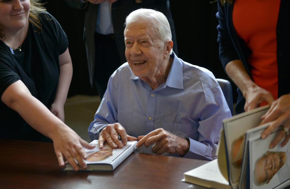 Former President Jimmy Carter signs his new book, u0022A Full Life: Reflections at 90,u0022 at the Nashville Public Library in 2015 in Tennessee.