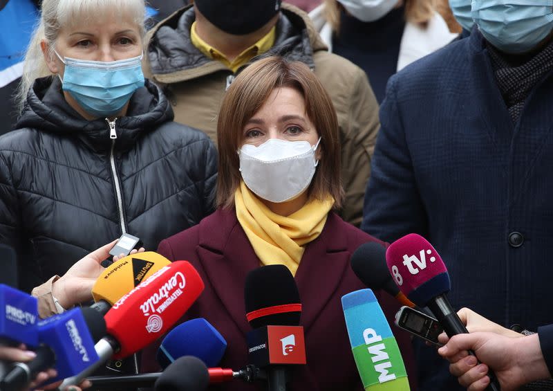 Maia Sandu, opposition candidate and former Prime Minister, visits a polling station during a presidential election in Chisinau