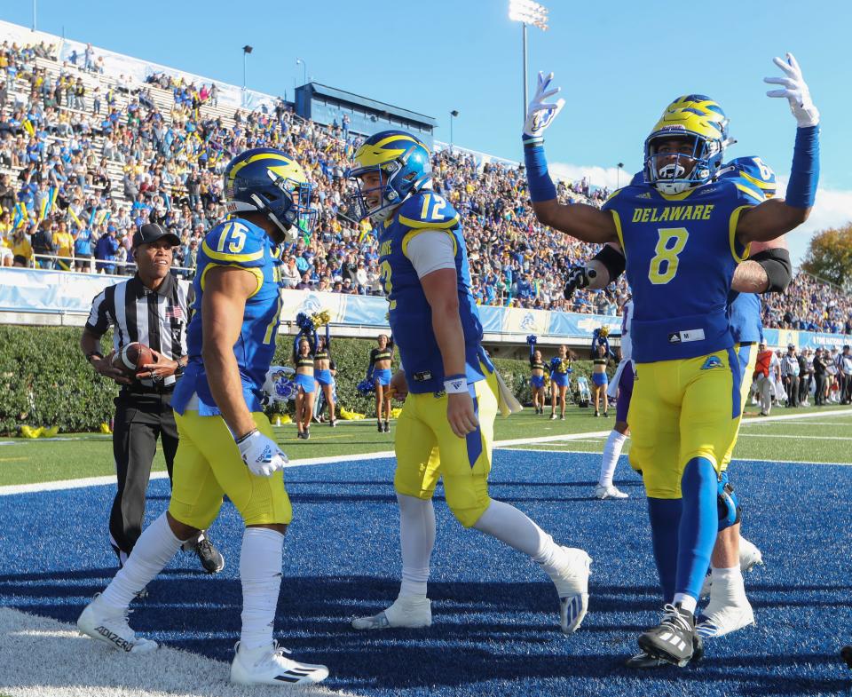 Delaware receiver James Collins (15) celebrates his second-quarter touchdown reception in Delaware's last game against CAA rival James Madison at Delaware Stadium Saturday, Oct. 23, 2021.