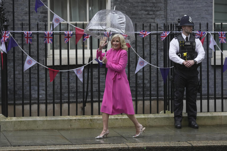 US First Lady Jill Biden waves to the media as she arrives in Downing Street to meet Akshata Murty wife of the British Prime Minister Rishi Sunak in London, Friday, May 5, 2023. The First Lady is in London to attend the Coronation of King Charles III, on Saturday May, 6.(AP Photo/Kin Cheung)