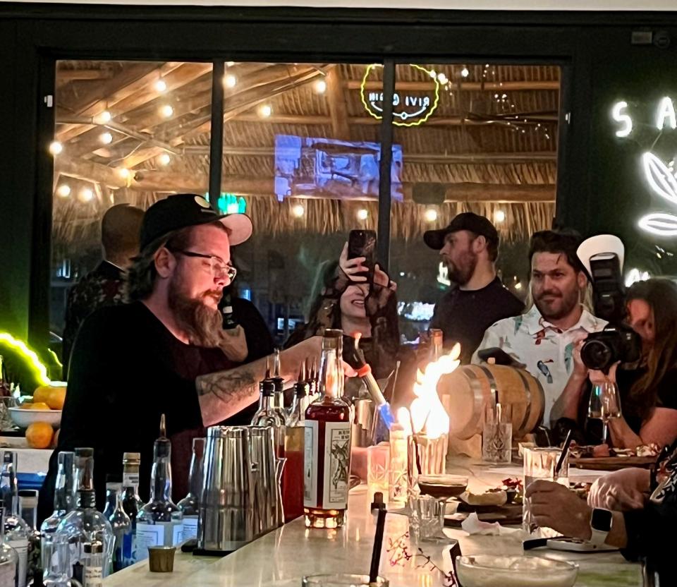 Deegan Baker, of ODA Pizzeria Bistro, competes the Rivi Gin and Redwood Empire Whiskey bartender competition at Sage on 47th.