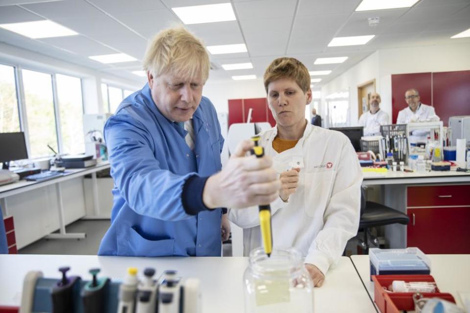 Boris Johnson visits the Mologic Laboratory in Bedfordshire, where scientists are working on quicker testing for Covid-19, 6 March.