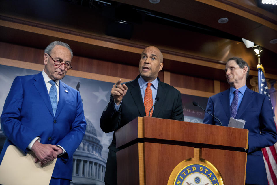 From left, Senate Majority Leader Chuck Schumer, D-N.Y., Sen. Cory Booker, D-N.J., and Sen. Ron Wyden, D-Ore., announce a draft bill that would decriminalize marijuana on a federal level Capitol Hill in Washington, on Wednesday, July 14, 2021. The bill, called the Cannabis Administration and Opportunity Act, would not only decriminalize marijuana, but also expunge the records of those with non-violent convictions related to cannabis and invest money into restorative justice programs. (AP Photo/Amanda Andrade-Rhoades)