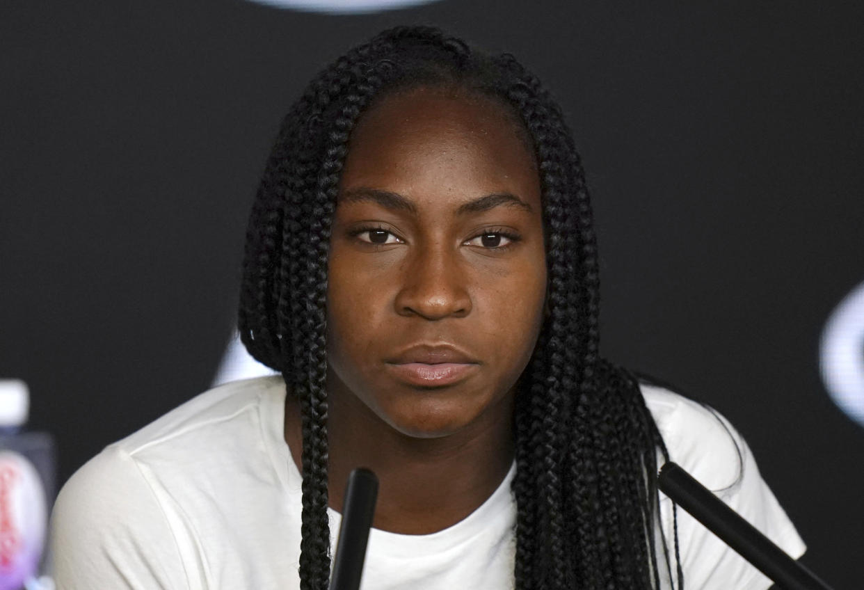 Coco Gauff of the U.S. talks at a press conference following her fourth round loss to compatriot Sofia Kenin at the Australian Open tennis championship in Melbourne, Australia, Sunday, Jan. 26, 2020. (AP Photo/Lee Jin-man)