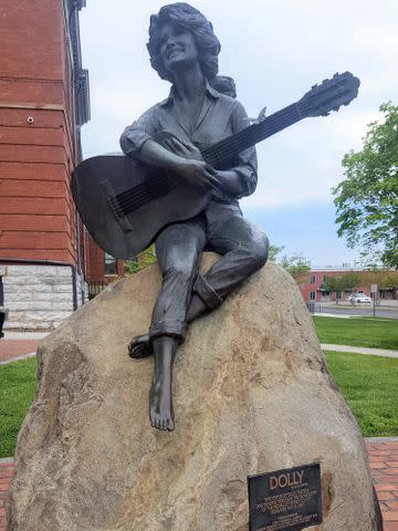 <p>Korrin Bishop</p> The bronze statue of Dolly Parton in downtown Sevierville is a stop along the Tennessee Music Pathways trail.