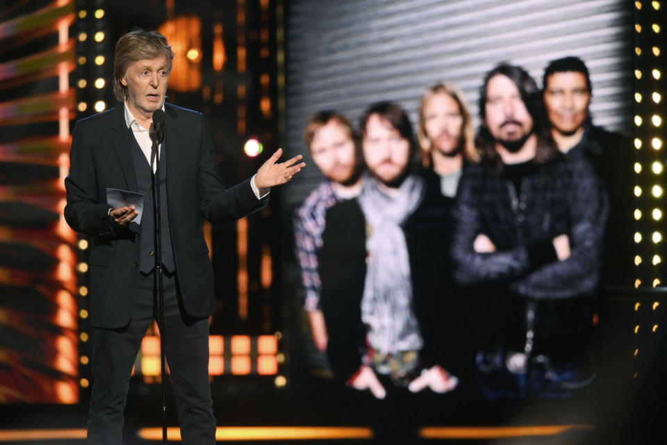 Paul McCartney, presenter for the Foo Fighters, speaks during the Rock & Roll Hall of Fame induction ceremony, Saturday, Oct. 30, 2021, in Cleveland. (AP Photo/David Richard) - Credit: AP