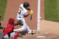 Pittsburgh Pirates' Ke'Bryan Hayes (13) hits into a fielder's choice off Cincinnati Reds relief pitcher Art Warren(not shown), driving in a baseball game's only run, during the eighth inning in Pittsburgh, Sunday, May 15, 2022. (AP Photo/Gene J. Puskar)
