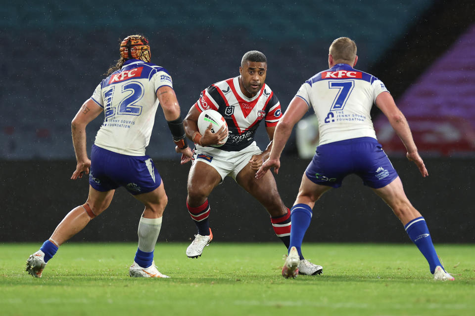SYDNEY, AUSTRALIA - APRIL 05:  Michael Jennings of the Roostersis tackled during the round five NRL match between Canterbury Bulldogs and Sydney Roosters at Accor Stadium on April 05, 2024, in Sydney, Australia. (Photo by Cameron Spencer/Getty Images)