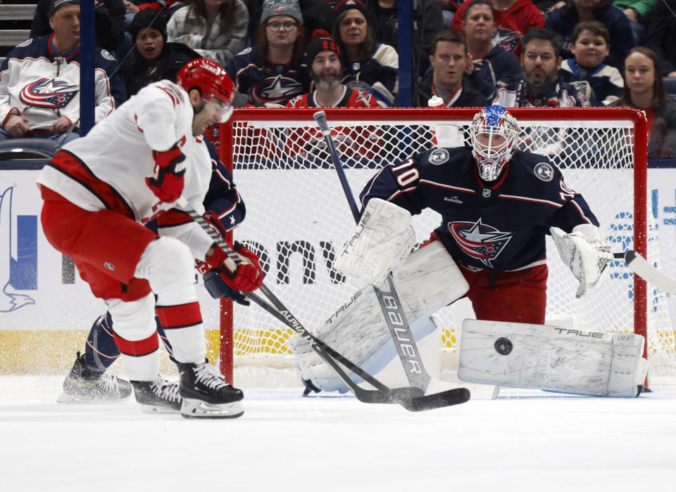 Carolina Hurricanes forward Max Pacioretty, left, shoots in front of Columbus Blue Jackets goalie Joonas Korpisalo during the second period of an NHL hockey game in Columbus, Ohio, Saturday, Jan. 7, 2023. Pacioretty scored on the play. (AP Photo/Paul Vernon)