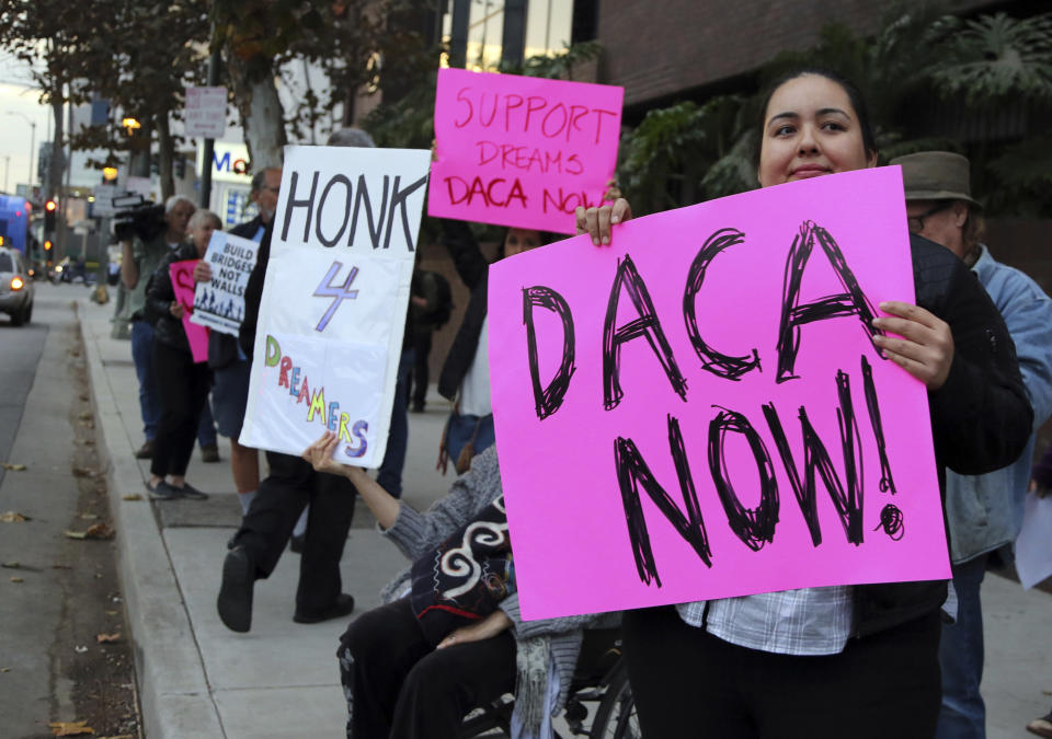 <p>Demonstrators urging the Democratic Party to protect the Deferred Action for Childhood Arrivals Act (DACA) rally outside the office of California Democratic Sen. Dianne Feinstein in Los Angeles, Jan. 3, 2018. (Photo: Reed Saxon/AP) </p>