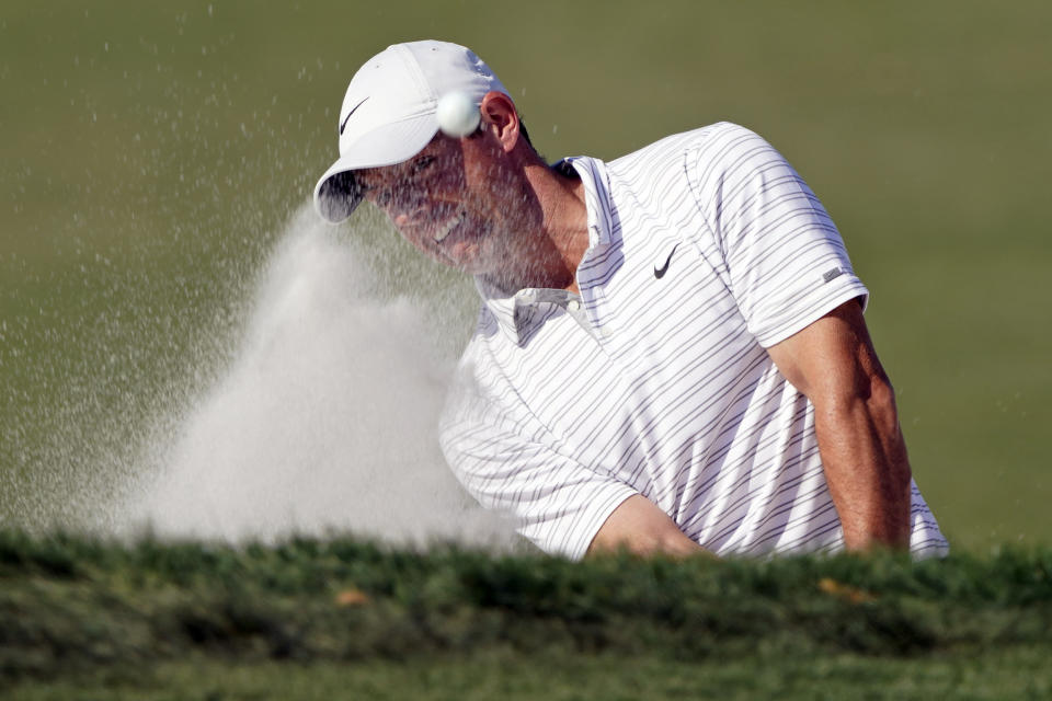 Rory McIlroy, of Northern Ireland, hits from a bunker on the ninth hole during the second round of the Arnold Palmer Invitational golf tournament Friday, March 4, 2022, in Orlando, Fla. (AP Photo/John Raoux)