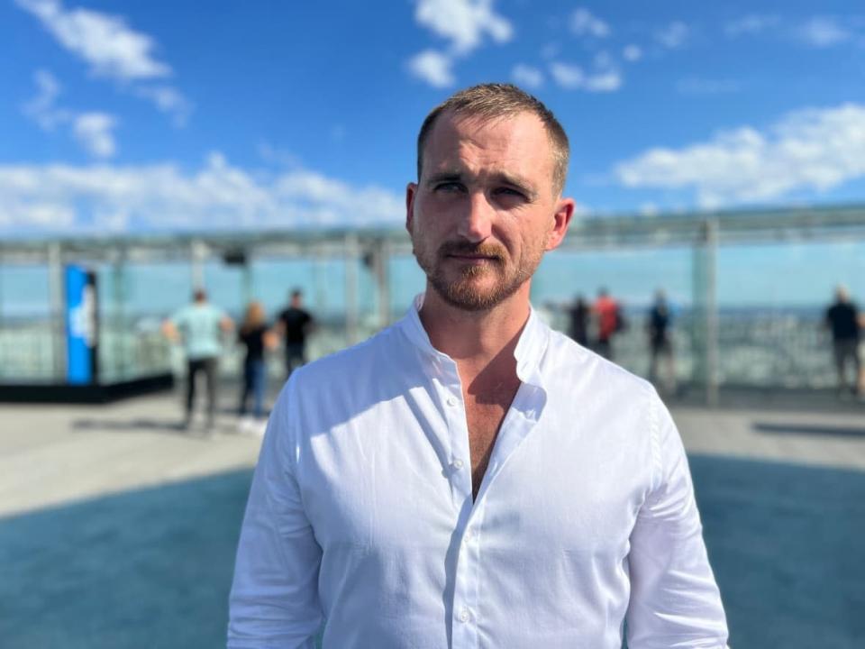 Pavel Filatyev, a former Russian paratrooper, spoke with CBC News in Paris on Sept 6., 2022. He was forced to flee Russia after posting a scathing rebuke of a military he fought for, and a government he served.  (Corinne Seminoff/CBC - image credit)