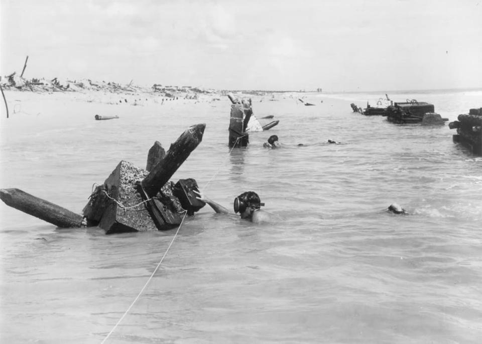 <div class="inline-image__caption"><p>WWII frogmen practice detonating shore obstacles.</p></div> <div class="inline-image__credit">National WWII Museum</div>