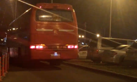 A still image from a video footage taken on April 6, 2018 shows a bus transferring Russian private military contractors leaving an airport outside Rostov-on-Don, Russia. REUTERS/Stringer