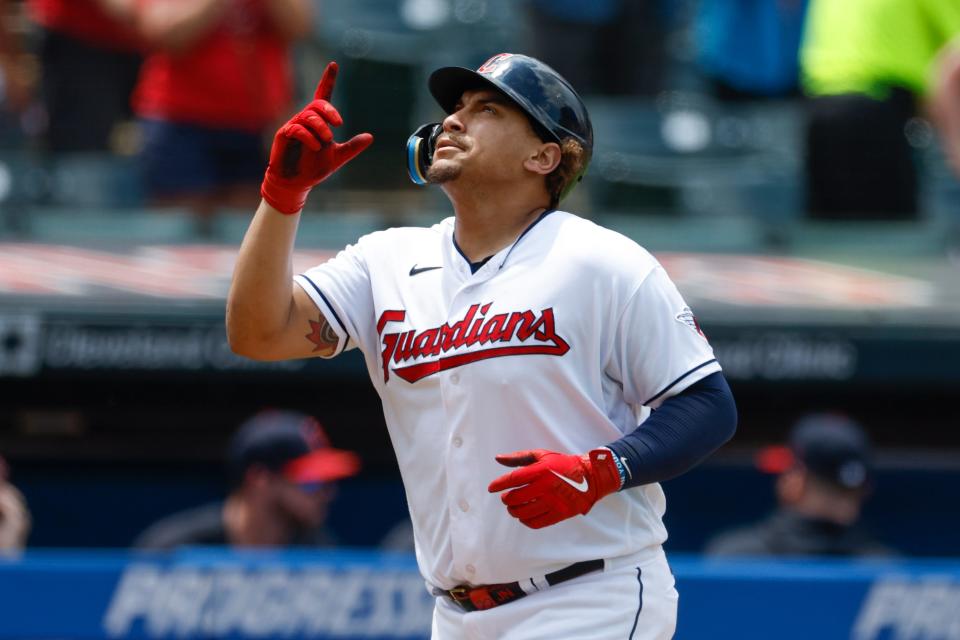 Josh Naylor celebrates as he rounds the bases after hitting a solo home run for the Guardians off Milwaukee Brewers starter Corbin Burnes during the second inning, Sunday, June 25, 2023, in Cleveland.