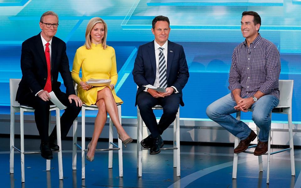 NEW YORK, NEW YORK - JANUARY 28: (EXCLUSIVE COVERAGE) Fox anchors Steve Doocy, Ainsley Earhardt and Pete Hegseth interview Rob Riggle visits at FOX Studios on January 28, 2020 in New York City. (Photo by Dominik Bindl/Getty Images) - Dominik Bindl /Getty Images North America 
