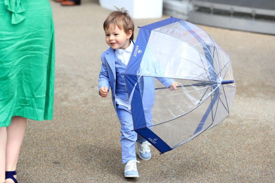 <p>This 2-year-old racegoer had on a pint-sized suit for the first day of races. </p>