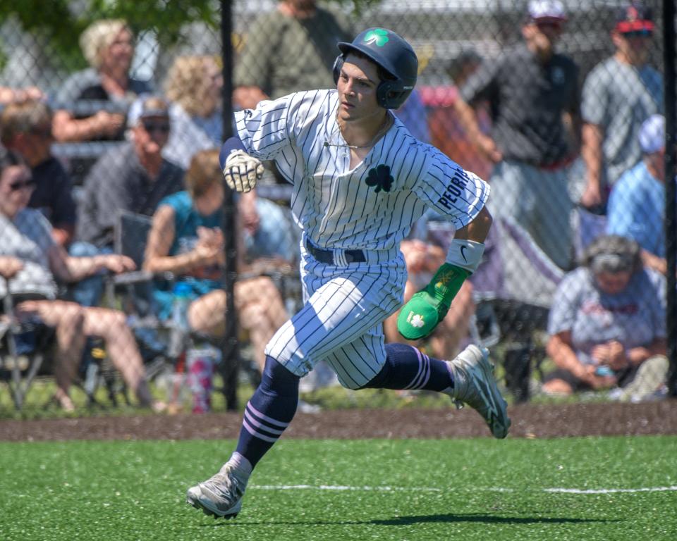 Peoria Notre Dame's Lawson Alwan rounds third base to score against Illini West in the first inning of their Class 2A baseball sectional title game Saturday, May 25, 2024 in Chillicothe.