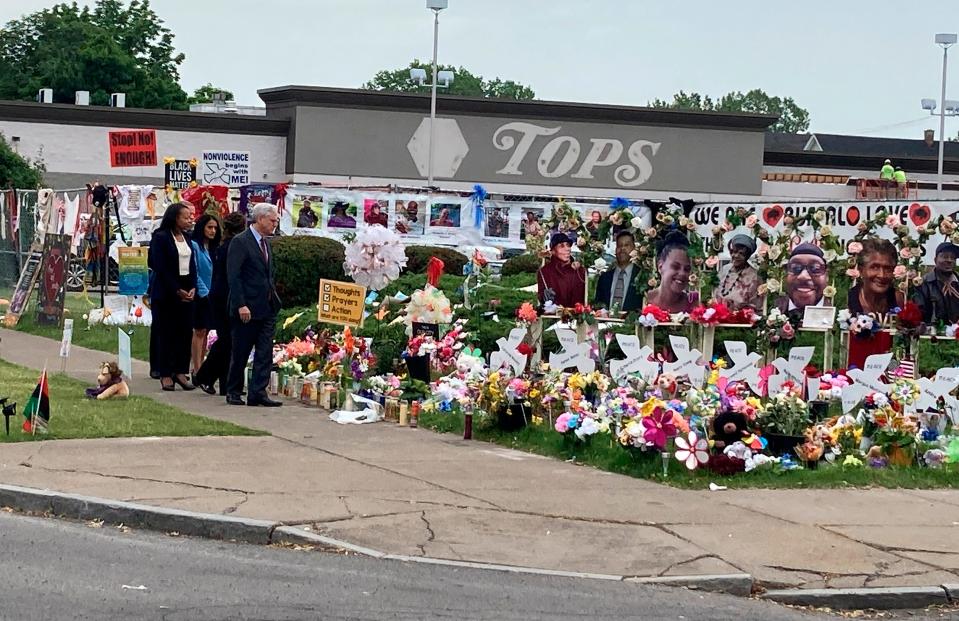 Attorney General Merrick Garland. visits the Tops Friendly Market grocery store in Buffalo, N.Y., on Wednesday, June 15, 2022, the site of a May 14 mass shooting in which 10 Black people were killed.  Garland was in Buffalo to announce federal hate crime charges against the 18-year-old shooter, Payton Gendron.