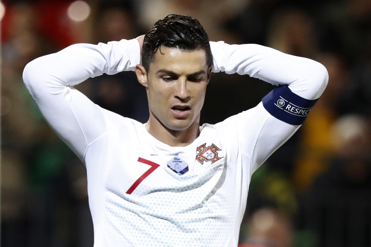 Portugal's Cristiano Ronaldo, reacts during the Euro 2020 group B qualifying soccer match between Lithuania and Portugal at LFF stadium in Vilnius, Lithuania, Tuesday, Sept. 10, 2019. (AP Photo/Mindaugas Kulbis)