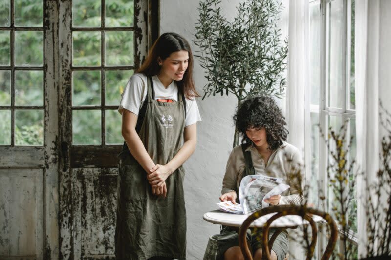 etiquette - lady reading the menu