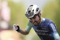 France's Valentin Paret-Peintre celebrates winning the 10th stage of the Giro d'Italia, Tour of Italy cycling race from Pompei to Cusano Mutri, Italy, Tuesday, May 14, 2024. (Massimo Paolone/LaPresse via AP)