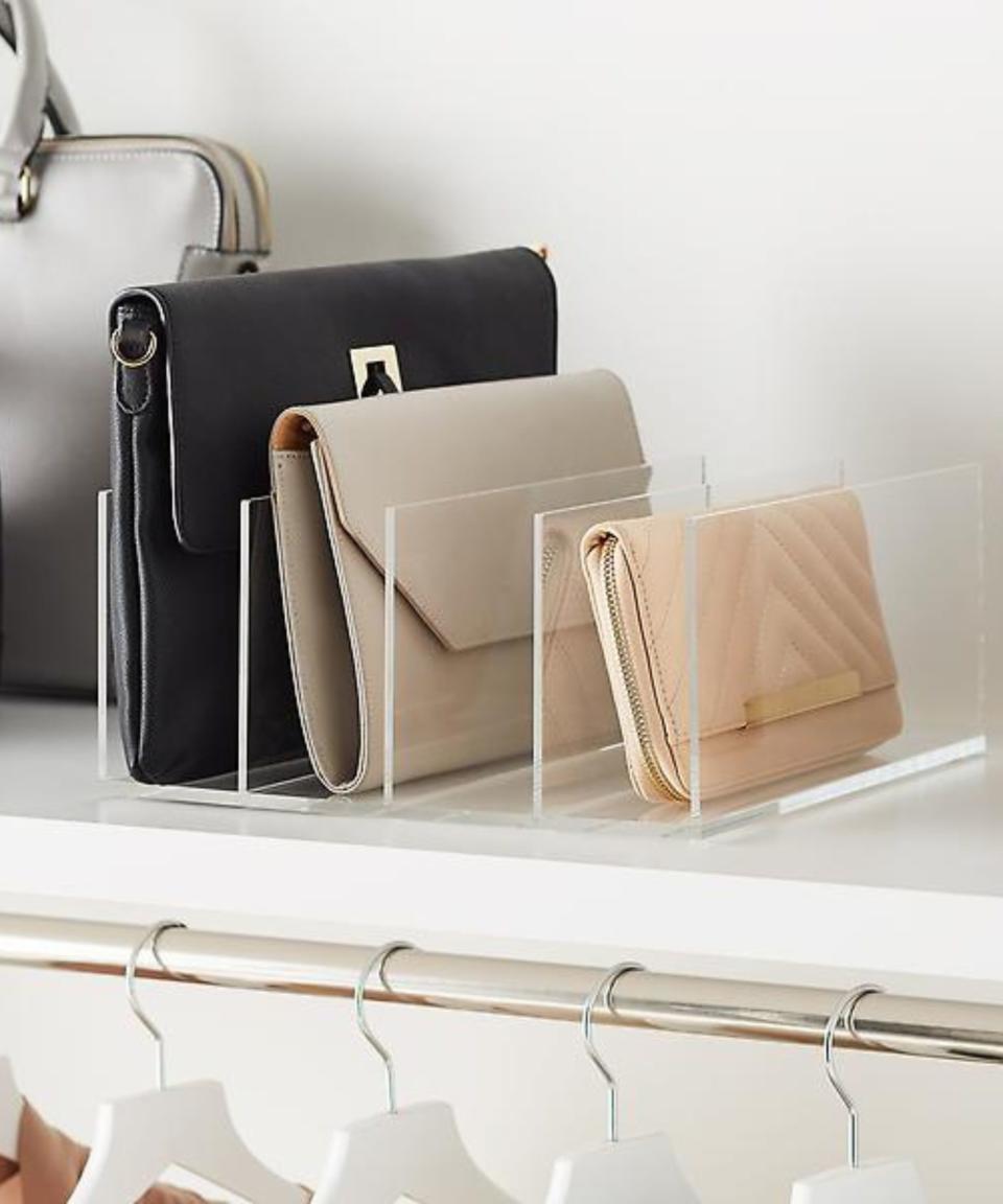 6. Store purses easily on a shelf with an acrylic divider