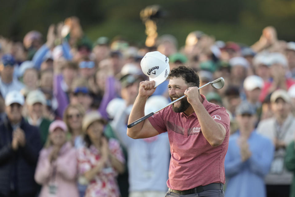 Jon Rahm, of Spain, celebrates on the 18th green after winning the Masters golf tournament at Augusta National Golf Club on Sunday, April 9, 2023, in Augusta, Ga. (AP Photo/Jae C. Hong)