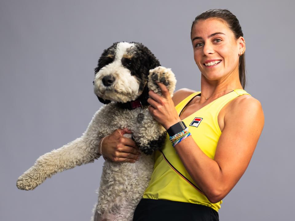 Emma Navarro posed with her dog during a WTA video shoot on day one of the BNP Paribas Open 2024.