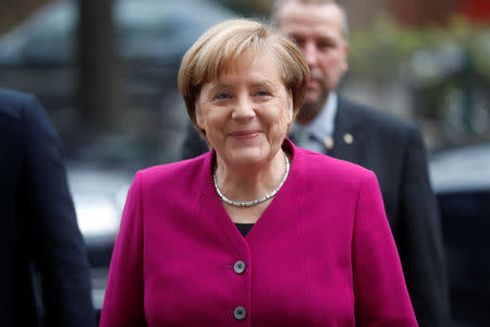 Leader of the Christian Democratic Union (CDU) and the acting German Chancellor Angela Merkel arrives for exploratory talks about forming a new coalition government at the SPD headquarters in Berlin, Germany, January 7, 2018. REUTERS/Hannibal Hanschke