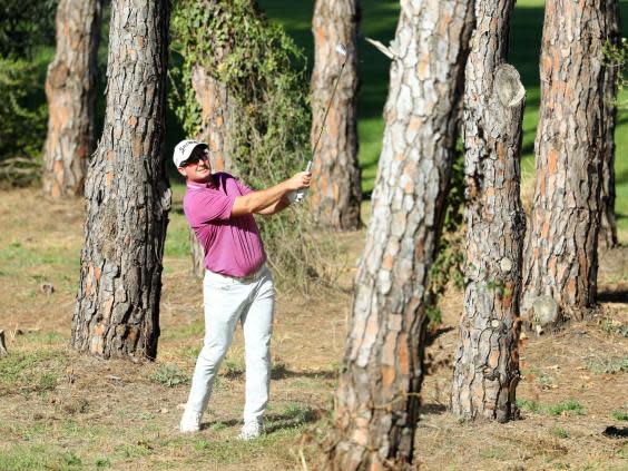 Ryan Fox plays out of the trees in Antalya (Getty)