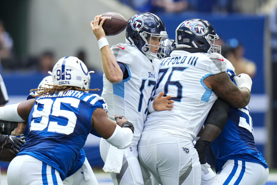 Tennessee Titans quarterback Ryan Tannehill (17) is sacked by Indianapolis Colts defensive tackle Taylor Stallworth (95) in the first half of an NFL football game in Indianapolis, Sunday, Oct. 31, 2021. (AP Photo/AJ Mast)