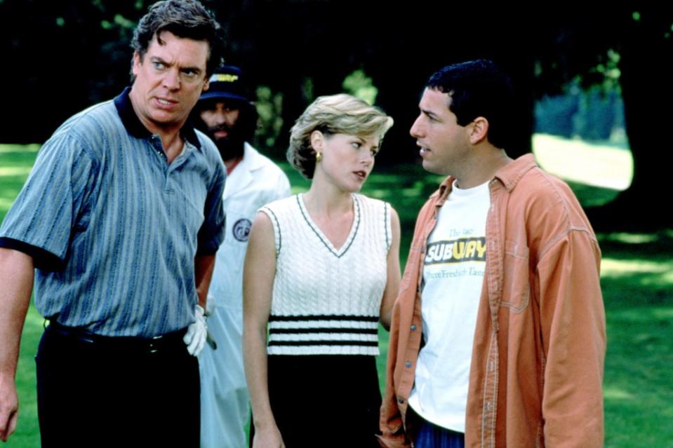 Christopher McDonald, Julie Bowen and Adam Sandler in a scene from “Happy Gilmore” (1996). ©Universal/Courtesy Everett Collection