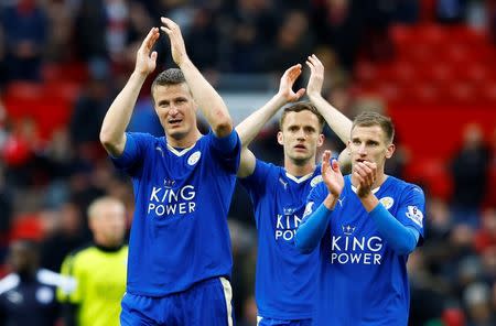 Britain Football Soccer - Manchester United v Leicester City - Barclays Premier League - Old Trafford - 1/5/16 Leicester City's Robert Huth applauds the fans at the end of the game Reuters / Darren Staples