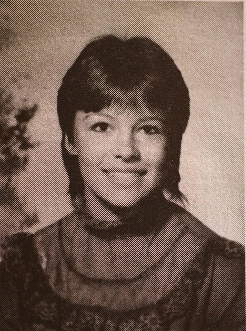 Anderson at age 16, posing for her high school yearbook photo (Getty Images)