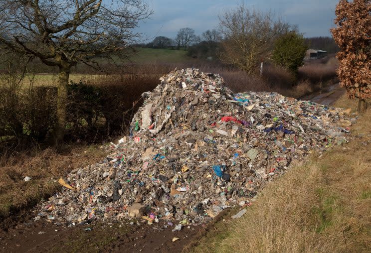 Villagers were left horrified after a mountain of waste was dumped in a quiet country lane.