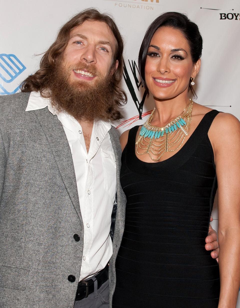 Bryan Danielson aka Daniel Bryan and Brie Bella attend WWE's 2014 SuperStars For Kids at the New Orleans Museum of Art on April 3, 2014 in New Orleans City