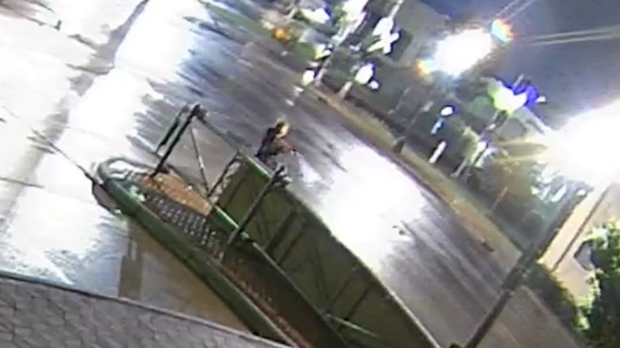 <em>A still taken from security footage of the incident. (WLNS)</em>