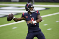 Houston Texans quarterback Deshaun Watson warms up before the start of an NFL football game against the Green Bay Packers Sunday, Oct. 25, 2020, in Houston. (AP Photo/Eric Christian Smith)