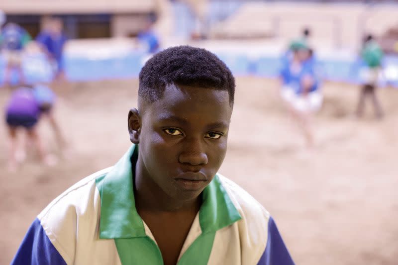 Cheik Ndaa, 13-year-old, poses for a picture during an interview with Reuters in Guarazoca