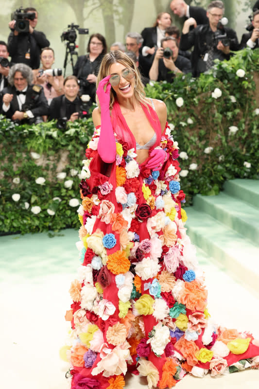 <p>Aliah Anderson/Getty Images</p><p>The actress flaunted a floral cape over gauzy halter and silver bra. She attended alongside Italian billionaire Leonardo Maria Del Vecchio.</p>
